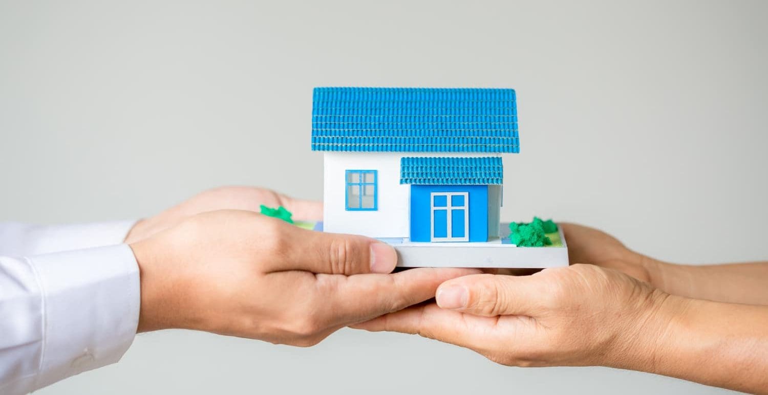 Executor reviewing probate documents before selling an inherited property in the UK.